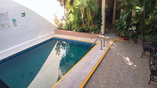 Bazén v ubytování Hotel Posada San Rafael nebo v jeho okolí