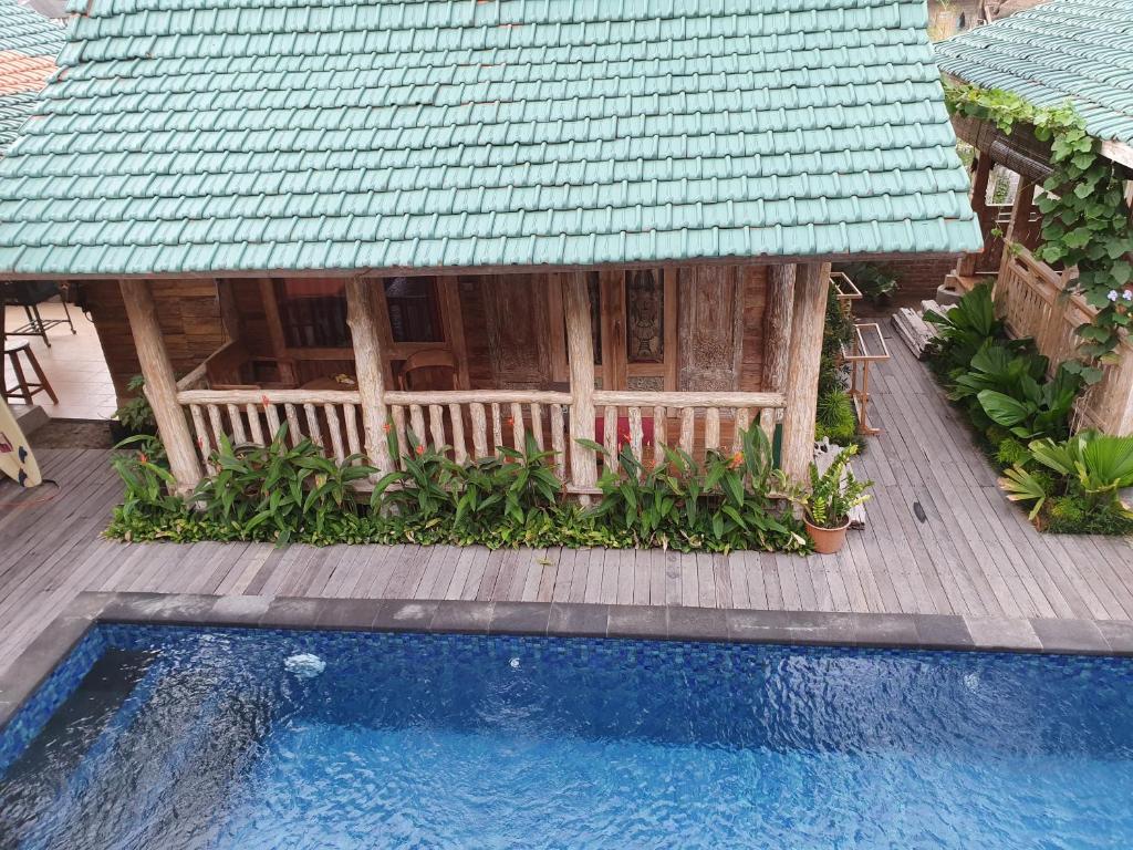 AgaLiving Medewi - Deluxe Bungalow