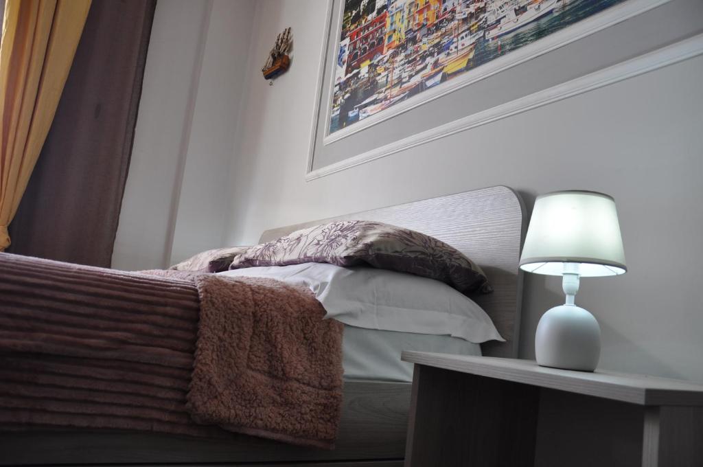 Łóżko lub łóżka w pokoju w obiekcie B&B Vesuvio Ruins