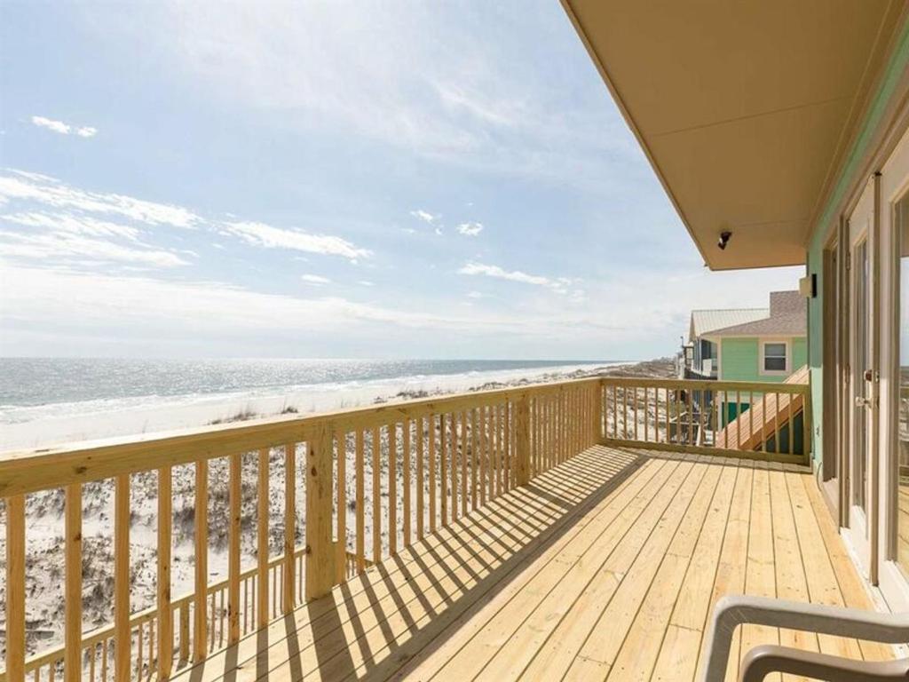 a balcony with a view of the beach at Hakuna Matata in Gulf Shores