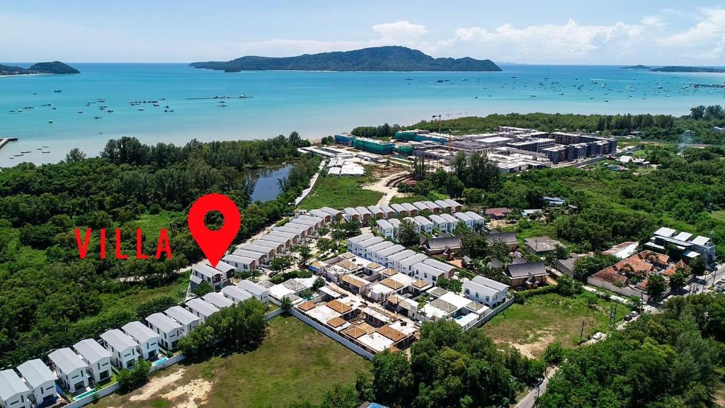 an aerial view of a resort with a red heart at Happy Family Villa in Phuket Town