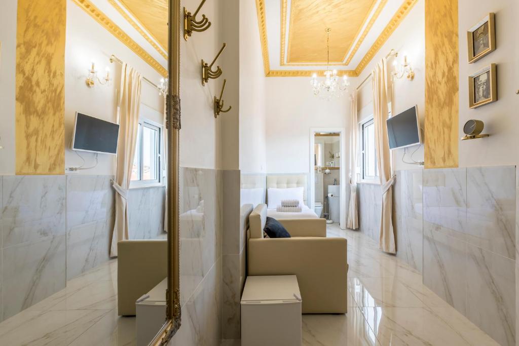 TV a/nebo společenská místnost v ubytování Olivia Luxury Rooms