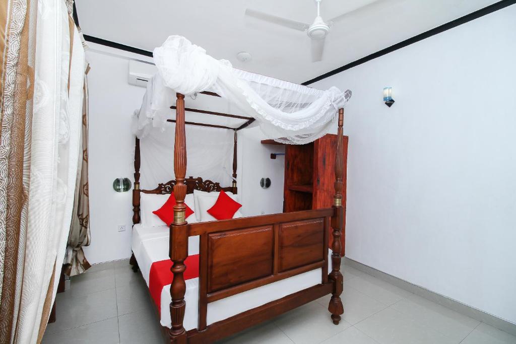 Postel nebo postele na pokoji v ubytování New Okay Hotel