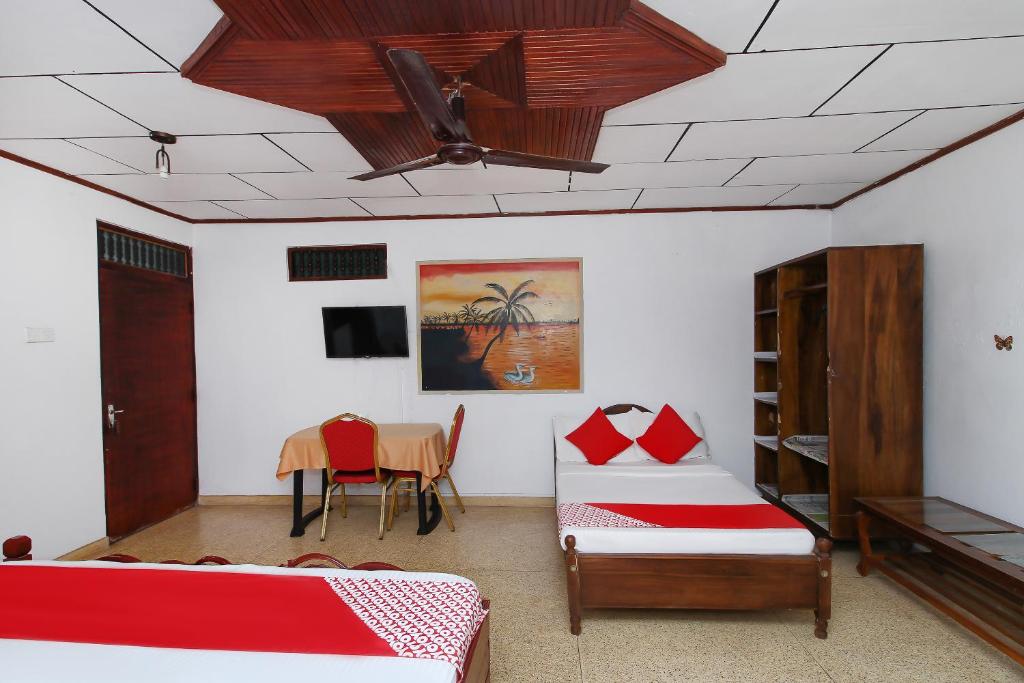Postel nebo postele na pokoji v ubytování New Okay Hotel