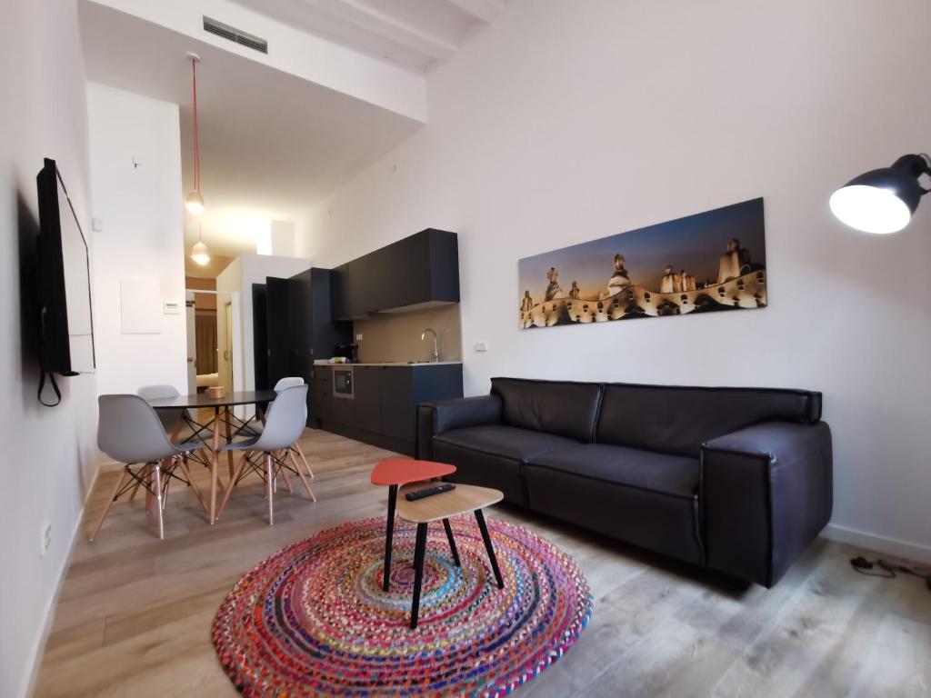 TV a/nebo společenská místnost v ubytování ClassBedroom Port Ramblas