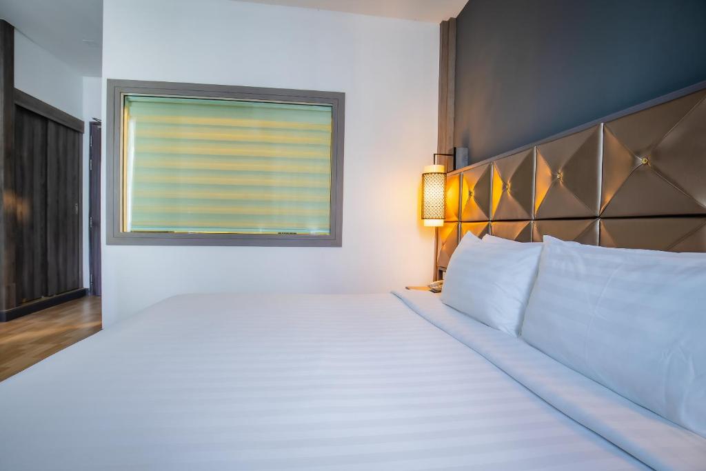 Postel nebo postele na pokoji v ubytování Add Plus Hotel & SPA