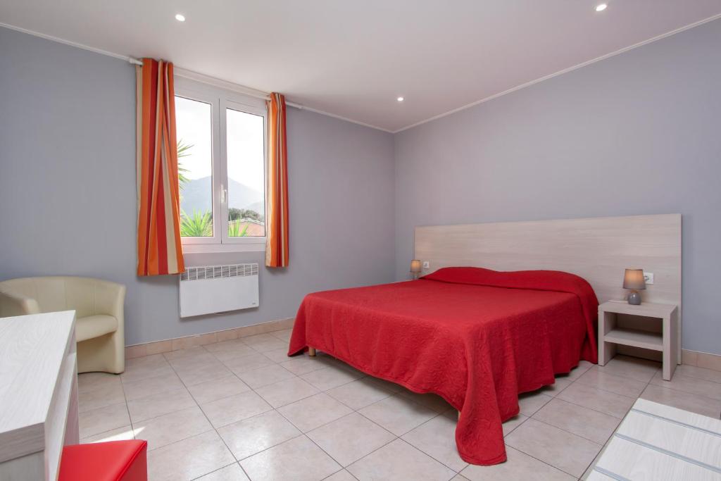 Postel nebo postele na pokoji v ubytování Hotel Arcu Di Sole