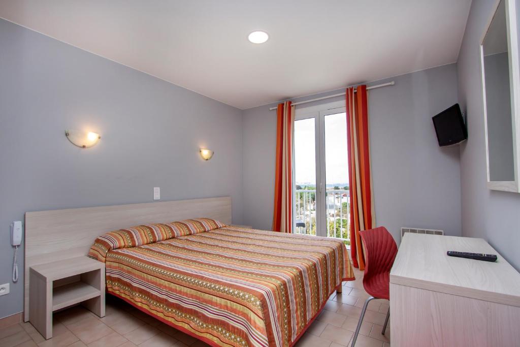 Postel nebo postele na pokoji v ubytování Hotel Arcu Di Sole