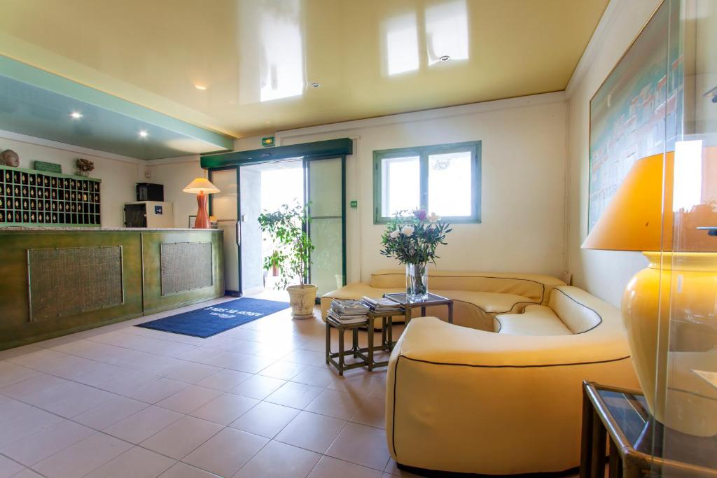 Kuchyň nebo kuchyňský kout v ubytování Hotel Arcu Di Sole