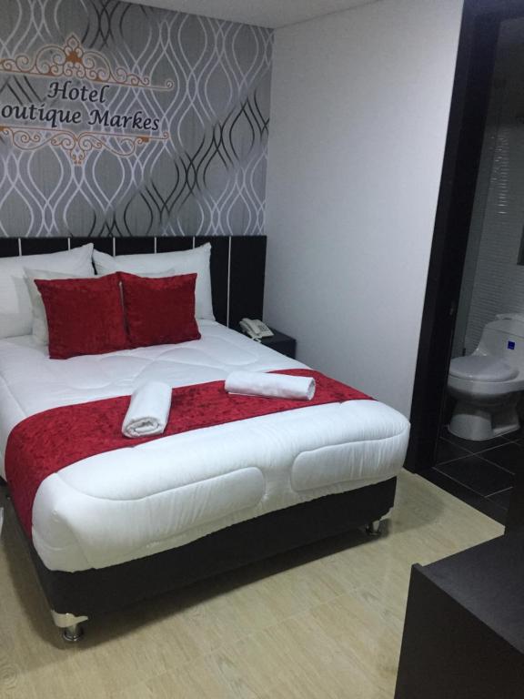 Postel nebo postele na pokoji v ubytování Hotel Boutique Markes