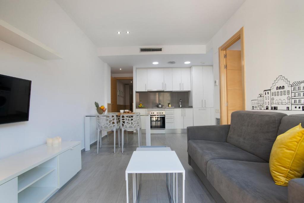 A kitchen or kitchenette at BBarcelona Gaudí Flats