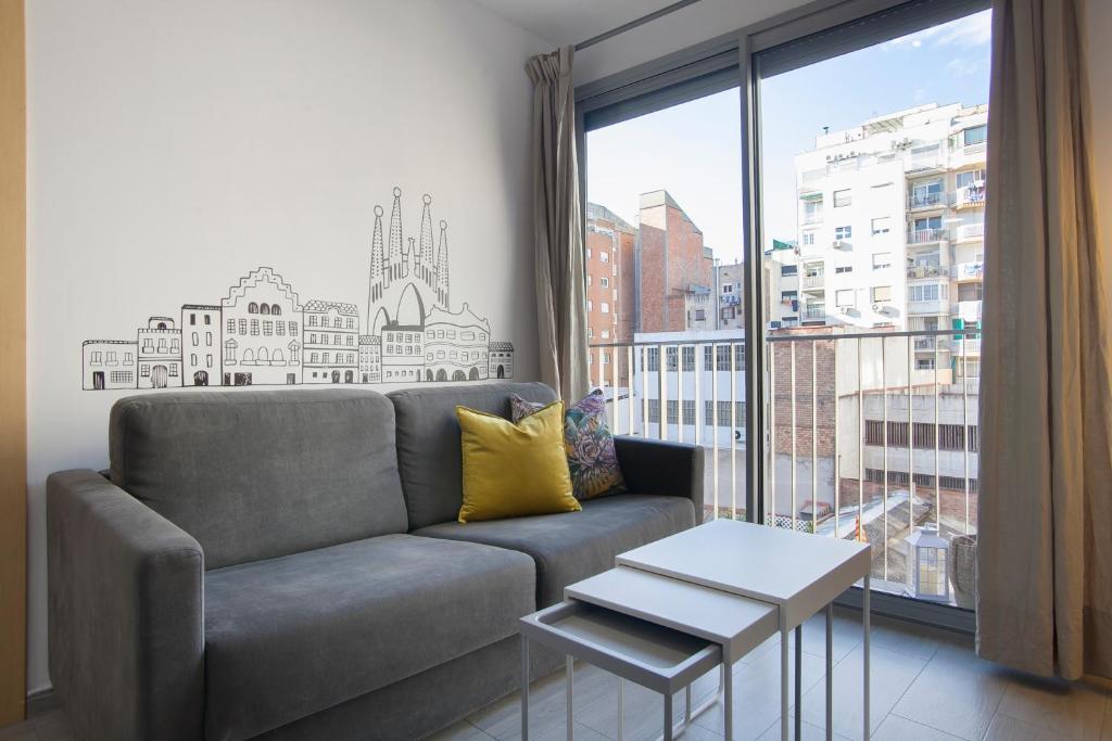 A seating area at BBarcelona Gaudí Flats