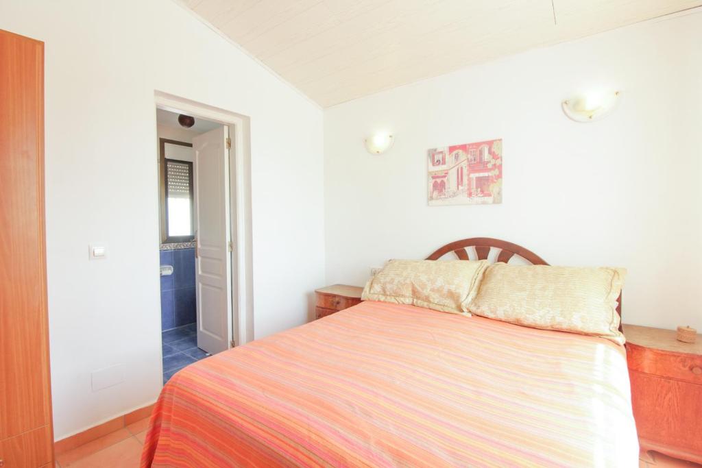 A bed or beds in a room at Villa Santa Lucia - 0204