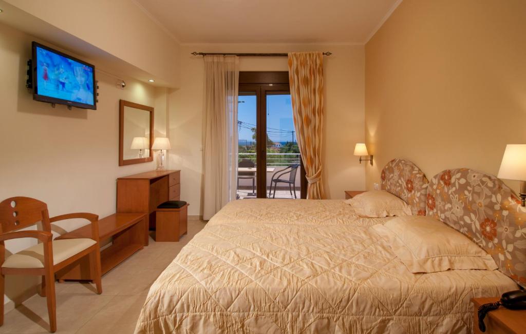 Postel nebo postele na pokoji v ubytování Kyniska Hotel