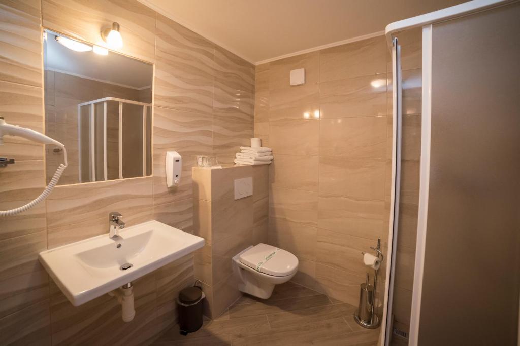 Kúpeľňa v ubytovaní Hotel Alfa