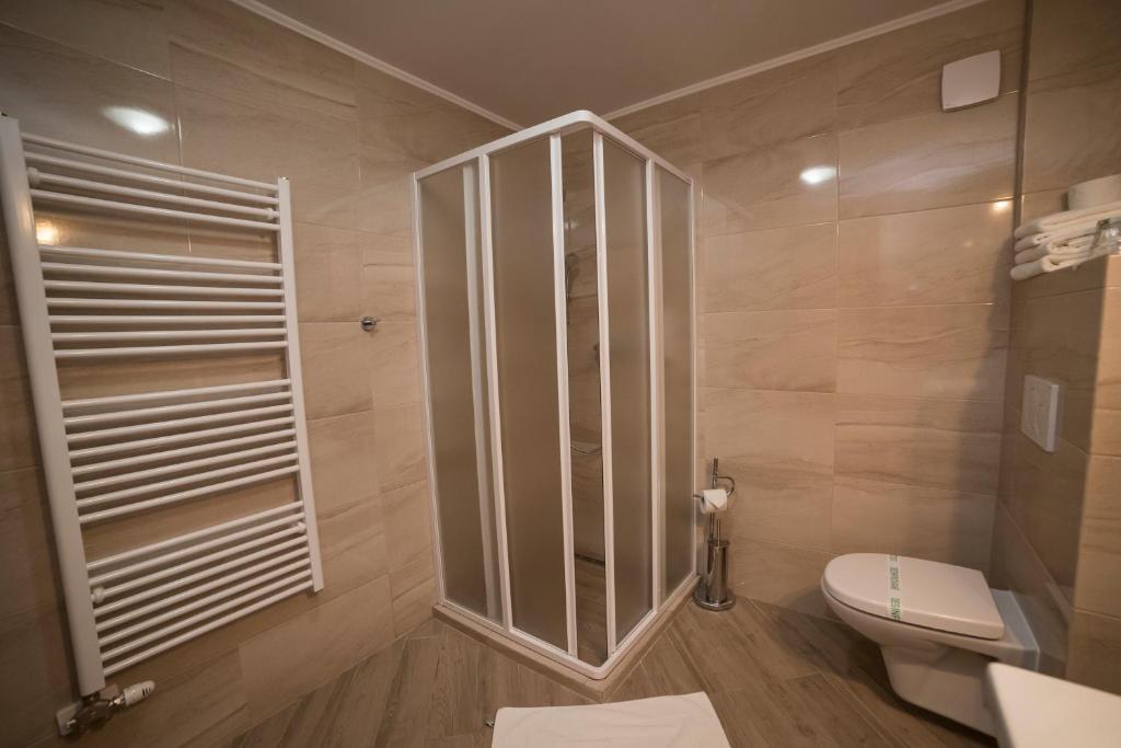 Kúpeľňa v ubytovaní Hotel Alfa