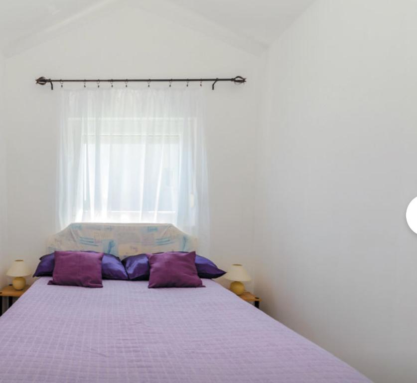 Postel nebo postele na pokoji v ubytování ZSA ZSA HOLIDAY HOME