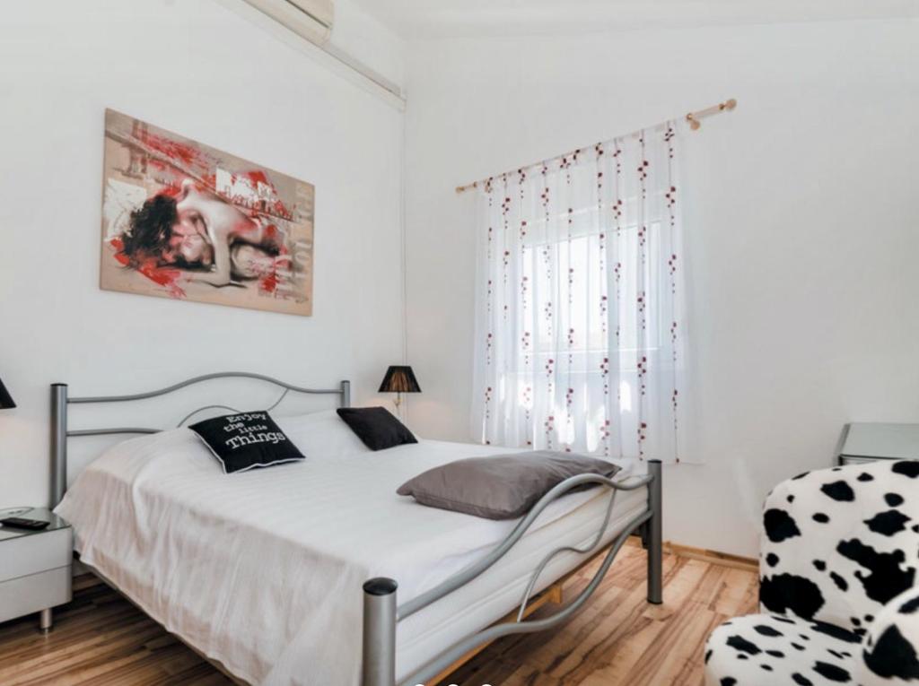 Postel nebo postele na pokoji v ubytování ZSA ZSA HOLIDAY HOME