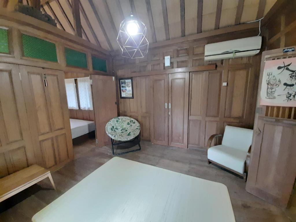 Postel nebo postele na pokoji v ubytování rumah566