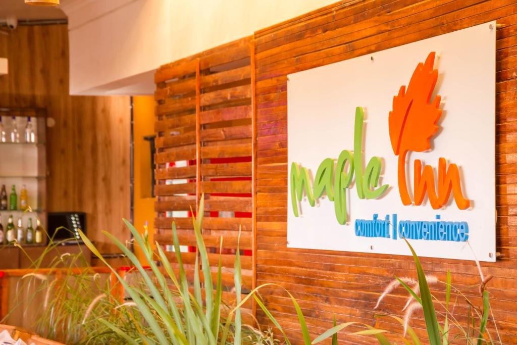 Certifikát, hodnocení, plakát nebo jiný dokument vystavený v ubytování Maple Inn Hotel