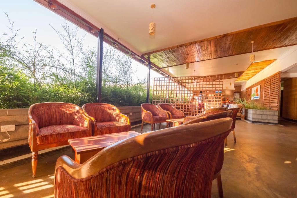 Posezení v ubytování Maple Inn Hotel