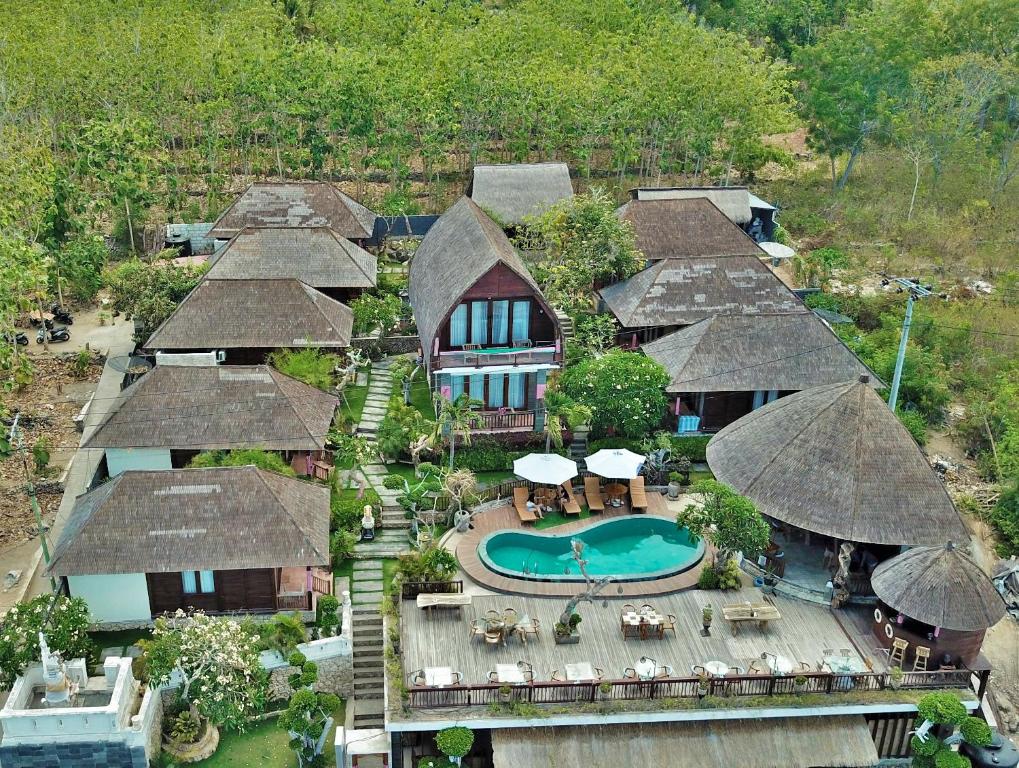 an aerial view of a resort with a swimming pool at Ocean Terrace Suite And Spa Luxury in Nusa Penida