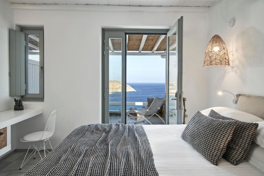 Postel nebo postele na pokoji v ubytování Mykonos Bliss - Cozy Suites, Adults Only Hotel