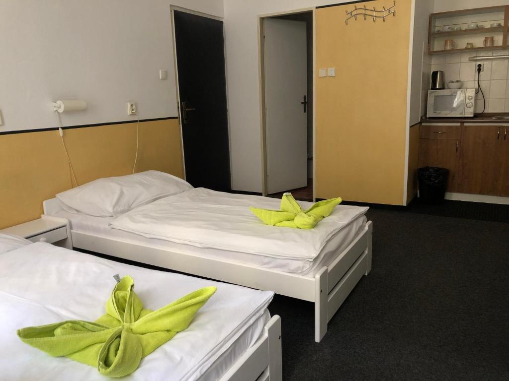Postel nebo postele na pokoji v ubytování Welcome Hostel & Apartments Praguecentre