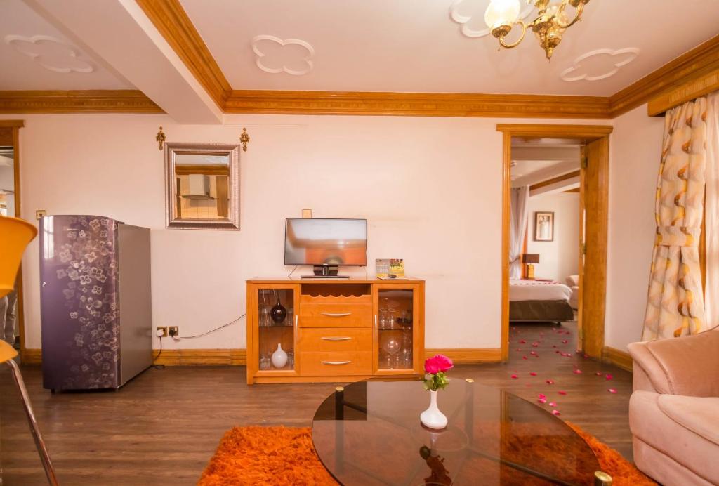 TV a/nebo společenská místnost v ubytování Marble Arch Hotel