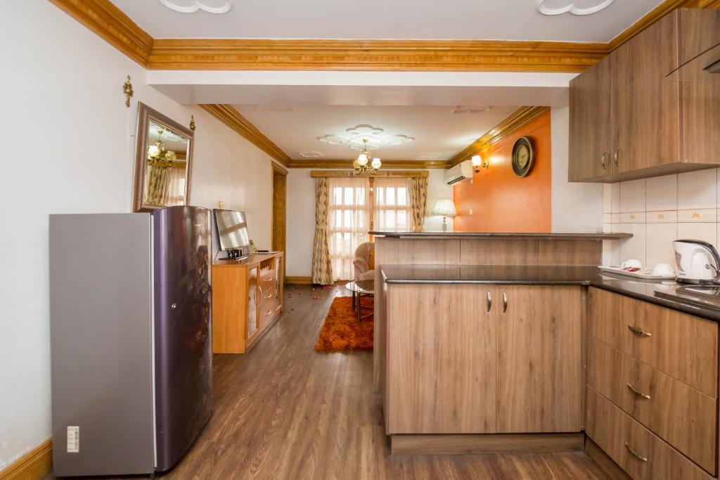 Kuchyň nebo kuchyňský kout v ubytování Marble Arch Hotel