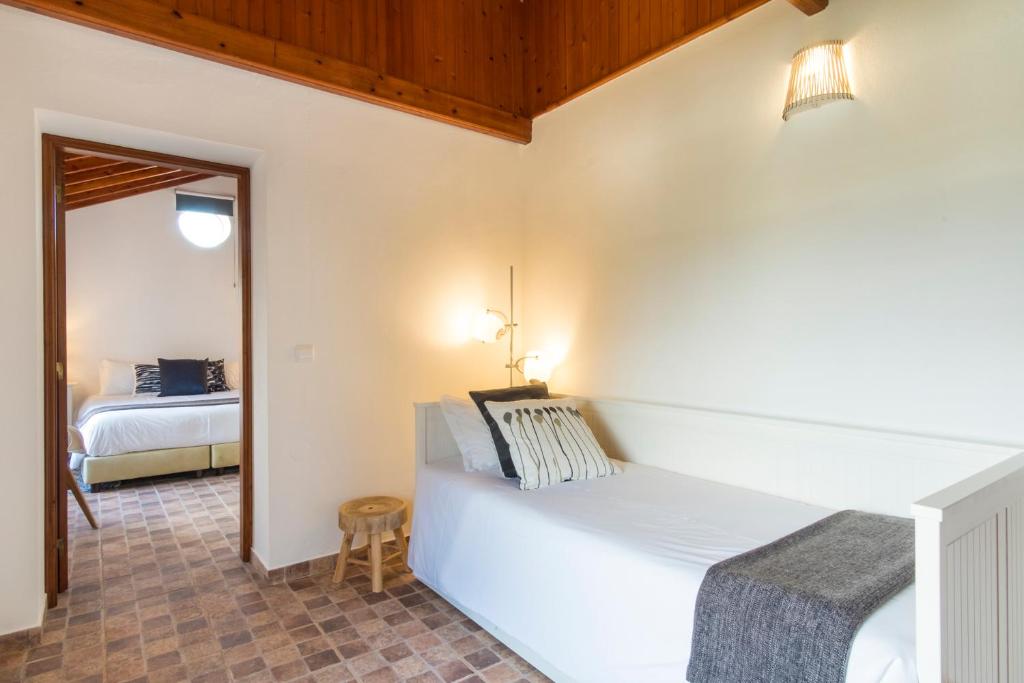Postel nebo postele na pokoji v ubytování Quinta do Torcaz