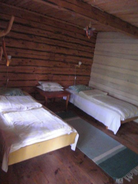 Postel nebo postele na pokoji v ubytování Järvenukka Puhkemaja