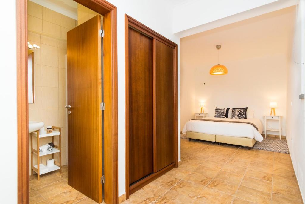 Postel nebo postele na pokoji v ubytování Quinta do Torcaz