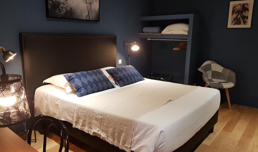 Postel nebo postele na pokoji v ubytování Le Beaugency