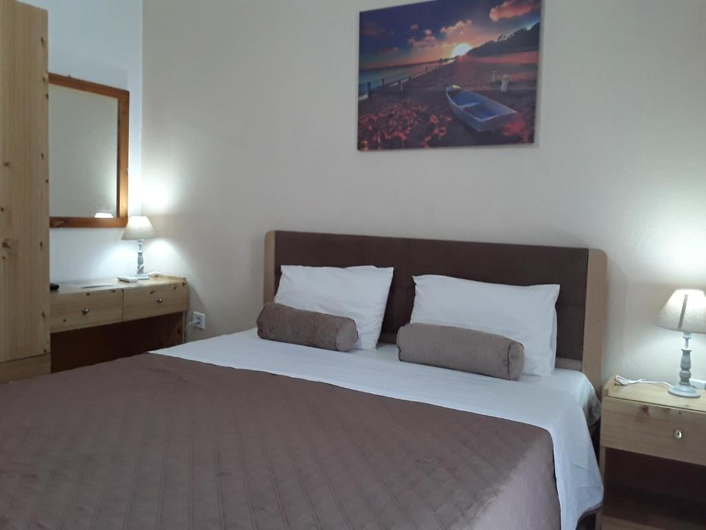 Postel nebo postele na pokoji v ubytování Hause Zorbas
