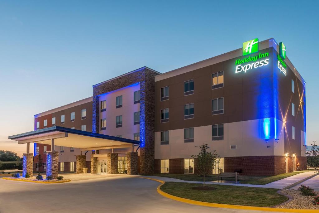 a hotel with a sign on the front of it at Holiday Inn Express Troy, an IHG Hotel in Troy