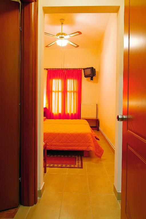 Postel nebo postele na pokoji v ubytování Sibylla Hotel