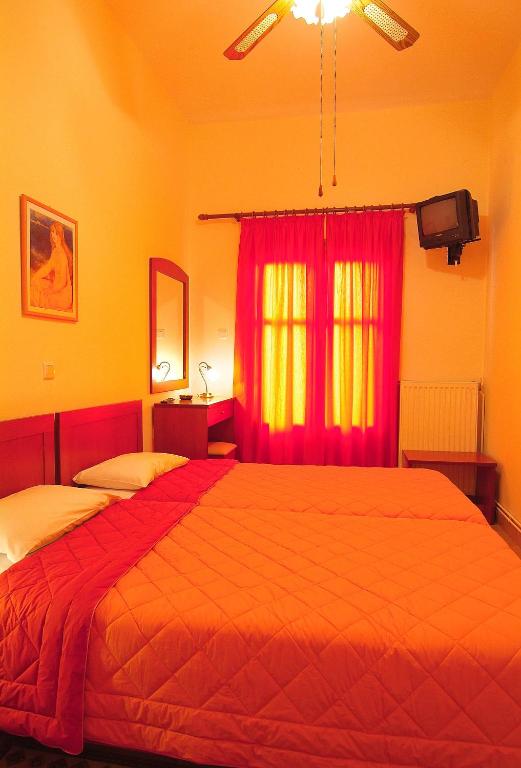 Postel nebo postele na pokoji v ubytování Sibylla Hotel