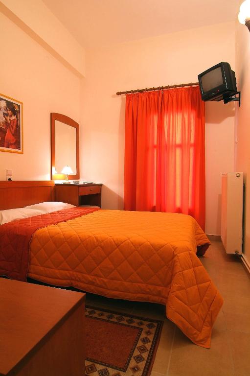 Postel nebo postele na pokoji v ubytování Sibylla Hotel
