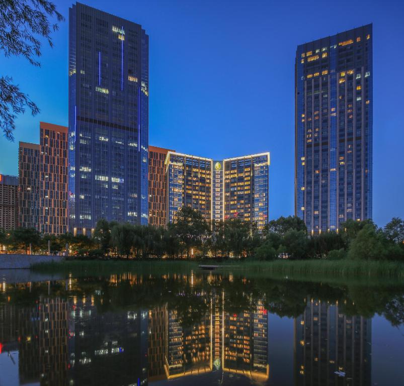 a view of a city skyline at night at InterContinental Taiyuan by IHG in Taiyuan