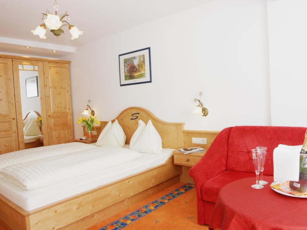 Postel nebo postele na pokoji v ubytování Sporthotel Snowwhite