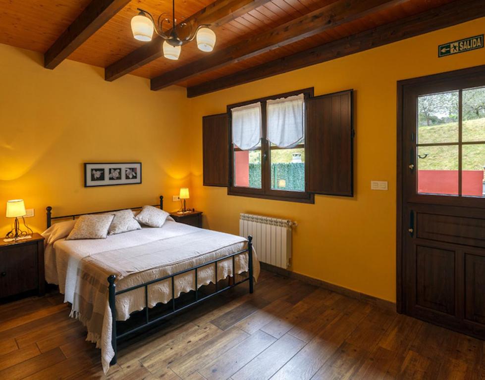 Posteľ alebo postele v izbe v ubytovaní Apartamentos Miradorderodiles Bellavista