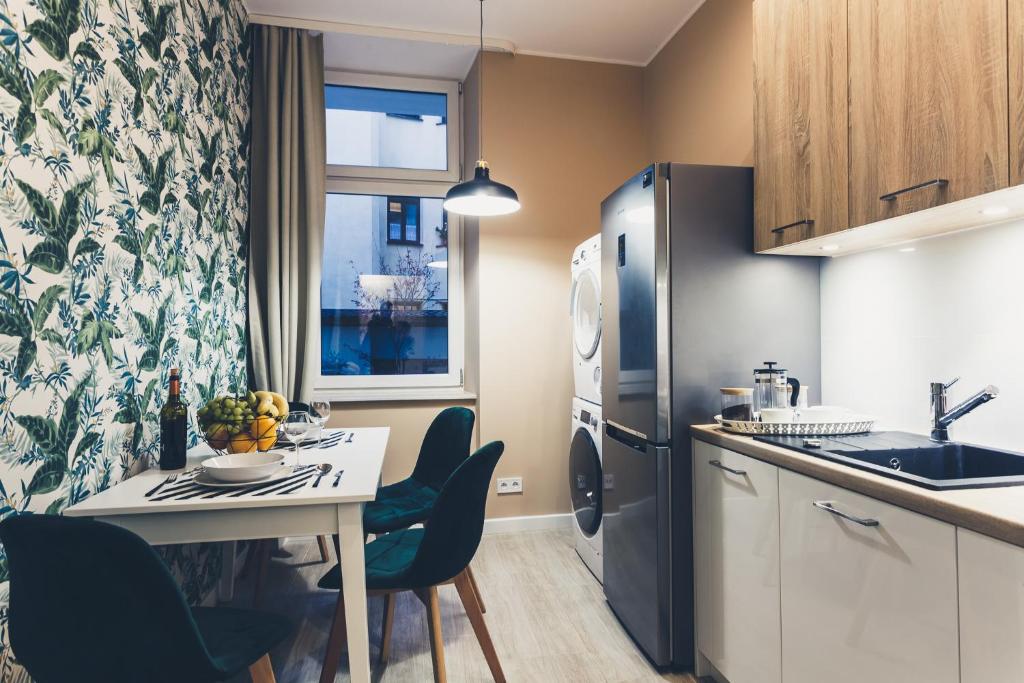 Kuchyňa alebo kuchynka v ubytovaní FatCat Apartments