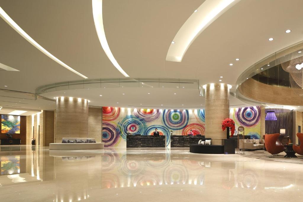 a lobby with a colorful wall in a building at Crowne Plaza Wuxi Taihu, an IHG Hotel in Wuxi