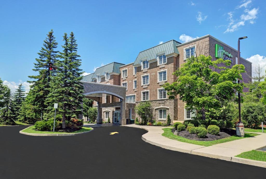 a building with a road in front of it at Holiday Inn Express Whitby Oshawa, an IHG Hotel in Whitby