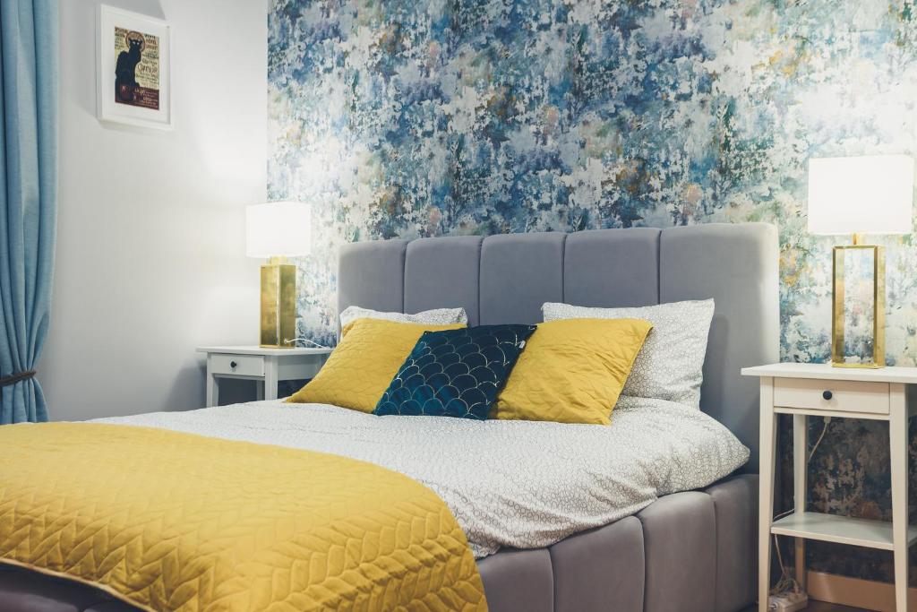 Posteľ alebo postele v izbe v ubytovaní FatCat Apartments