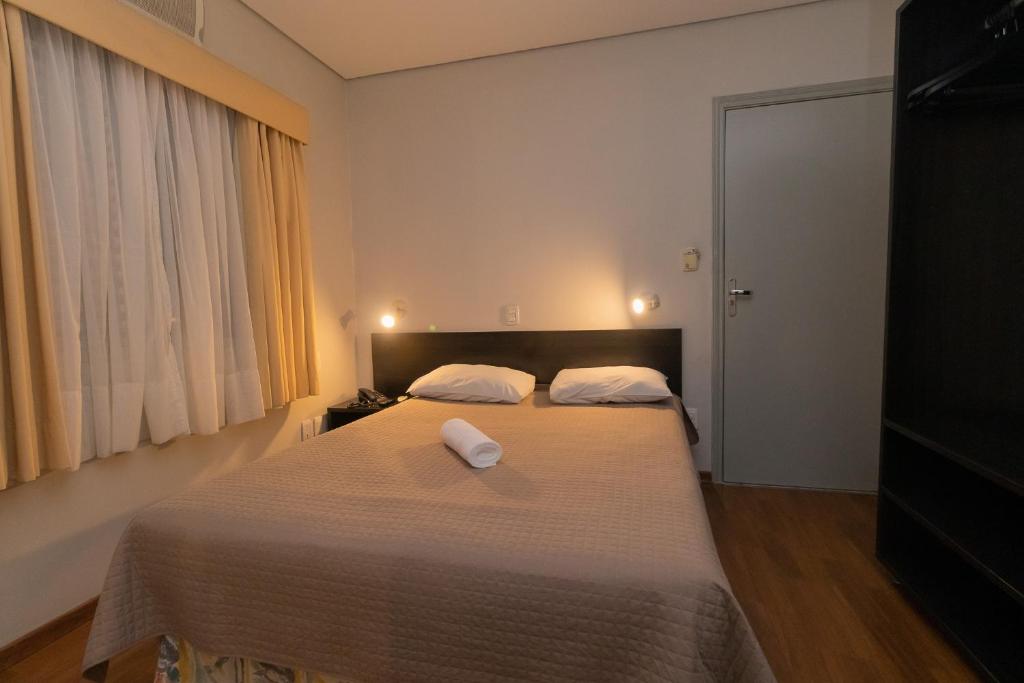 Postel nebo postele na pokoji v ubytování Hotel Bramig