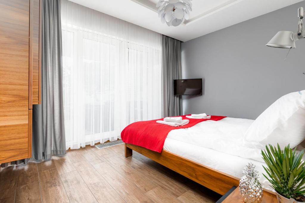 Posteľ alebo postele v izbe v ubytovaní Apartament Playa Baltis 10