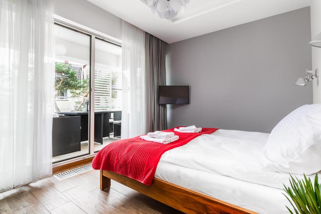 Posteľ alebo postele v izbe v ubytovaní Apartament Playa Baltis 10