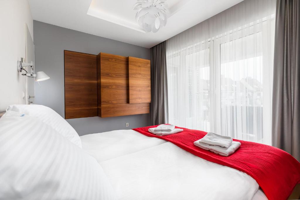 Posteľ alebo postele v izbe v ubytovaní Apartament Playa Baltis 10